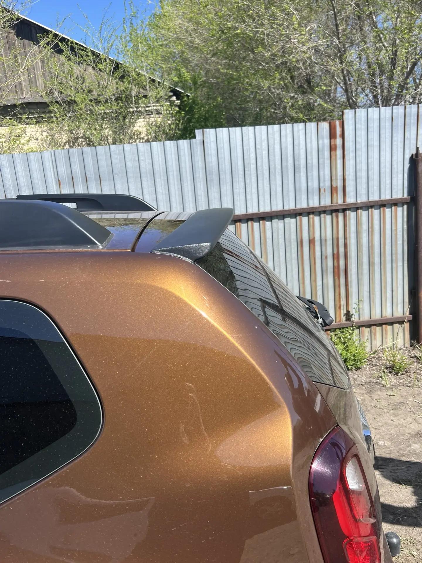 Спойлер двери задка Renault Duster I (шагрень) ООО "Автостайл"